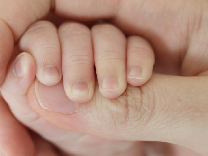 Een baby met drie ouders